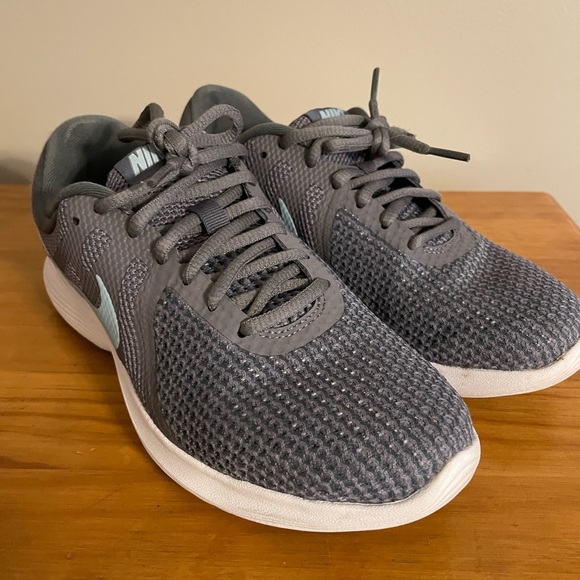 Nike Shoes - Nike Revolution 4 gray with light blue swish Size 7.5 Wide